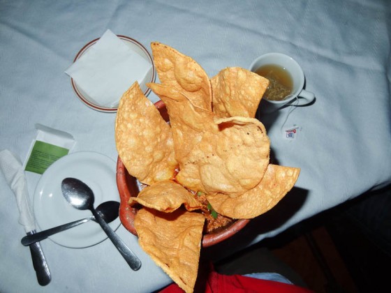 Anafre - Fried Tortilla Dipped In Beans, Cheese, Meat, Etc.