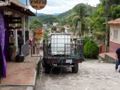 Guatemalan Truck Delivering Water To Honduran Restaurant Guatemalan Truck Delivering Water To Honduran Restaurant