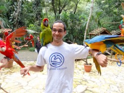 Me with birds at Macaw Mountain Bird Park In Copan Ruinas Honduras