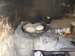 Cooking Tortillas Over A Fire