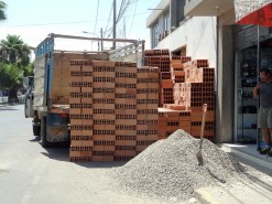Shutting Down A Street Lane With Construction Materials Shutting Down A Street Lane With Construction Materials