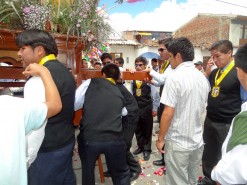 The Men Carrying The Float