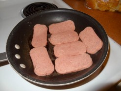 Frying The Strips Of Spam