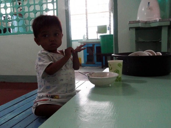 a little girl at the mother teresa home