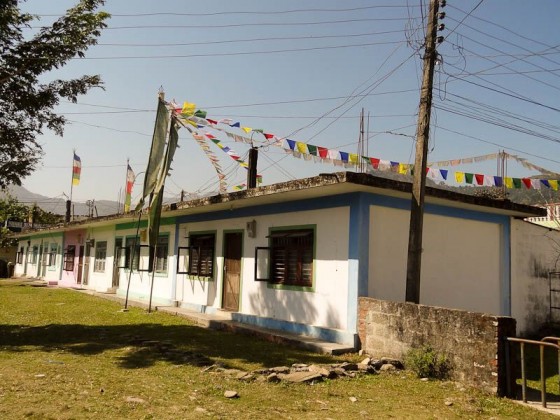 Flags Atop The Homes In The Camp