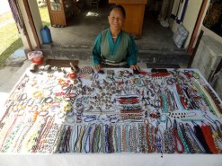 The Souvenir Seller With Her Products The Souvenir Seller With Her Products