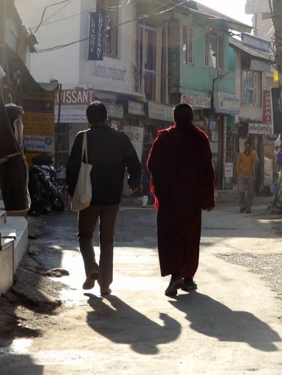 Monk And Normal Guy Walking Down The Street