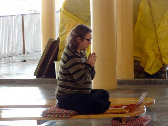 Prayer In Front Of The Temple