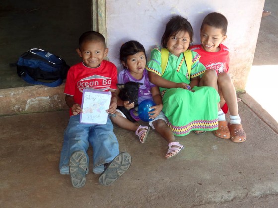 Happy Siblings With Mother's Day Card