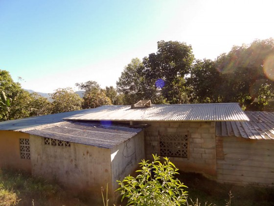 House With Solar Panel On Roof