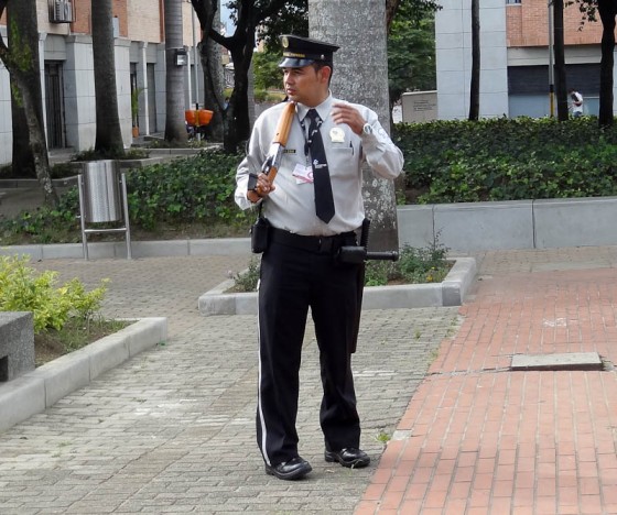 Security Guard With Rifle In A Colombian Park