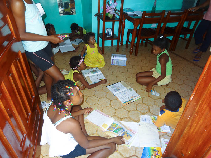 Kids Studying In A House