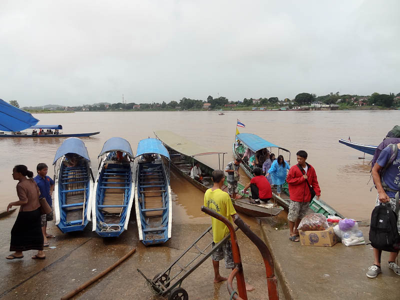 After Lao Immigration, Crossing The River By Boat To Thailand