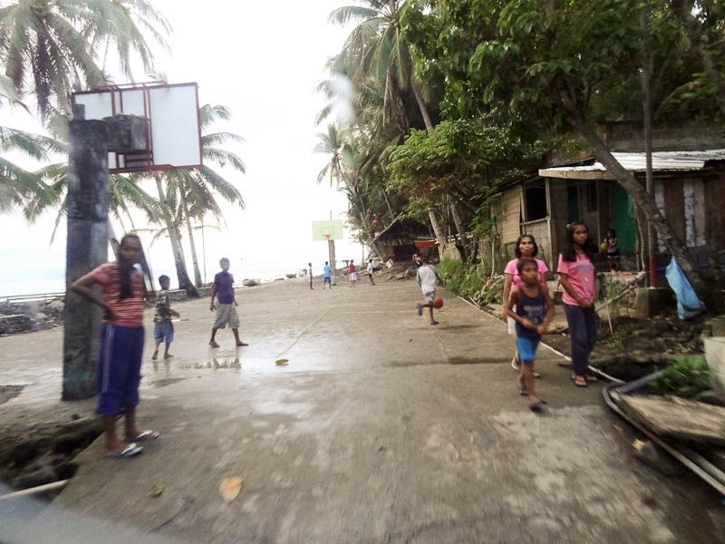 A Basketball Court In The Middle Of The Street