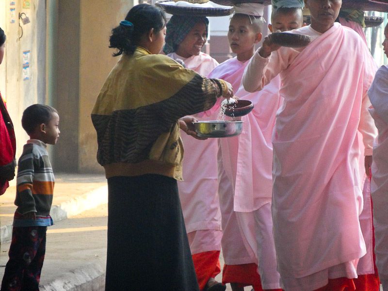 Buddhist Nuns Receiving Alms