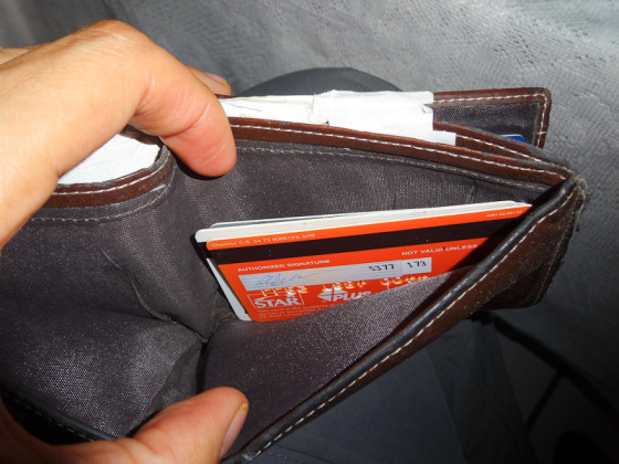 Empty Wallet And Rearranged Credit Cards