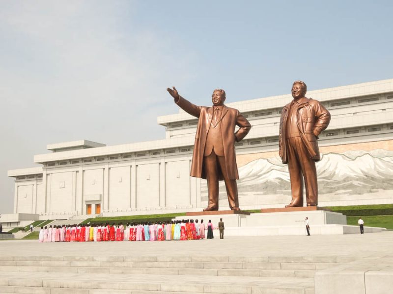 A Group Of Korean Women At The Grand Monument